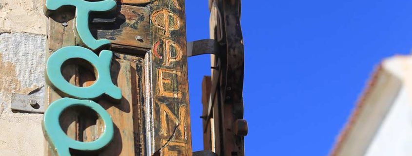 classic guitar & shutter composition, sign of the caf(r)é Laoutari, Syros island, Greece